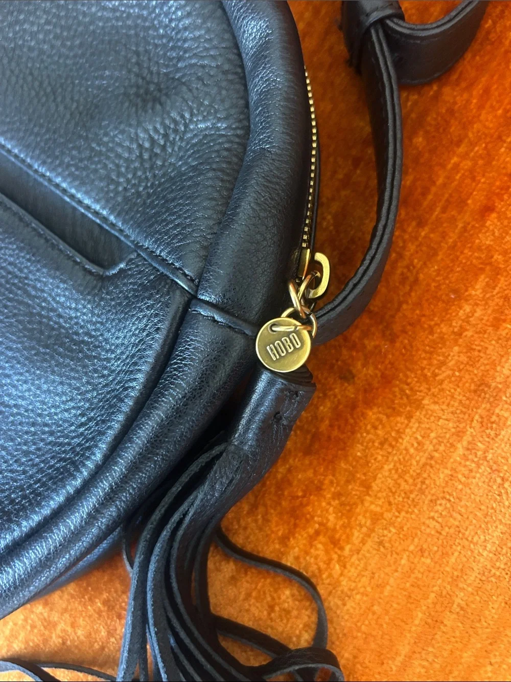 HOBO Black Leather Round Crossbody Bag with Tassel - Picture 4 of 7